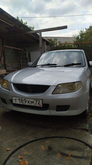 Mazda: Mazda Familia: 2002 г., 1.5 л, Автомат, Газ, Седан