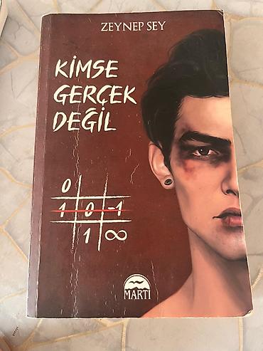 kitab seyf: Kitab: Kimse Gerçek Değil Müəllif: Zeynep Sey Nəşriyyat: Martı — 1