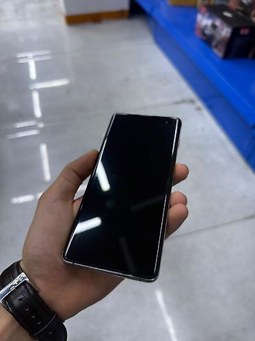 Мобильные телефоны и аксессуары: Samsung Galaxy S10 Plus, цвет - Черный, Отпечаток пальца — 3
