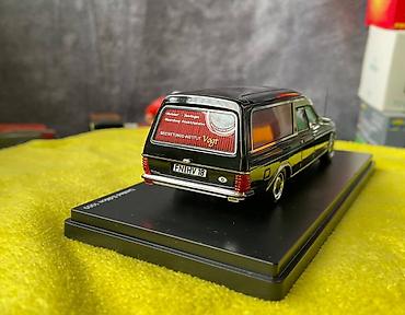 Avtomobil modelləri: Коллекционная модель Mercedes-Benz 200 W123 Hearse black 1982 Schuco — 21