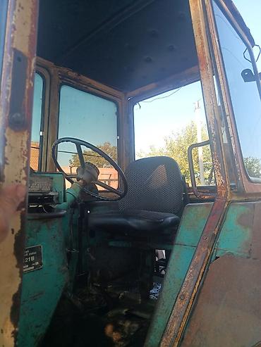 Kommersiya nəqliyyat vasitələri: Ekskavator-yükləyici traktor - Ön hissədə iri yükləmə kovası, arxa — 9
