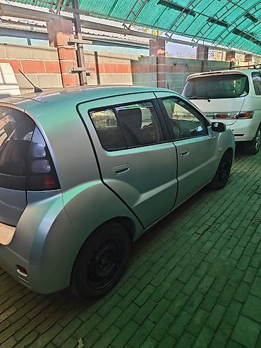 toyota opa 2003: Компактный городской хэтчбек с необычным футуристичным дизайном — 5