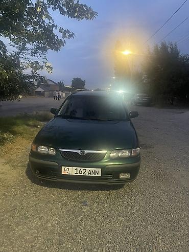w211 e500: Mazda 626: 1999 г., Механика, Универсал — 6