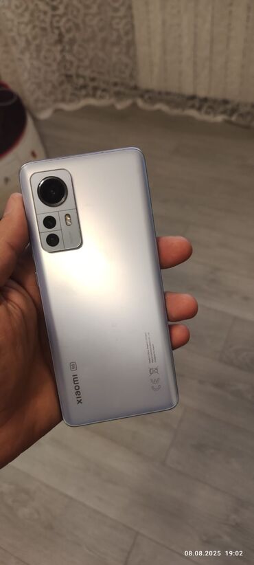 musiqi dinlə: Xiaomi 12, 256 GB, rəng - Mavi, 
 Sensor