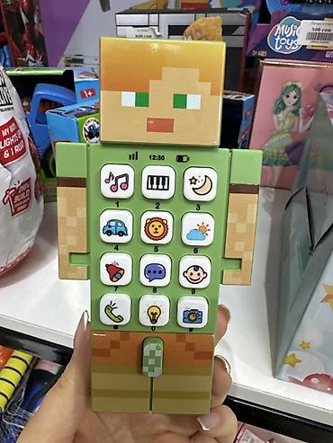 телефон игрушки: Детский музыкальный телефон-игрушка «Enlightenment Phones» в стиле — 1