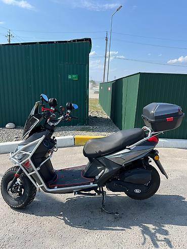 super soco: Скутер 50–150 см³ (визуально — максискутер форм-фактора “ADV”) с — 2