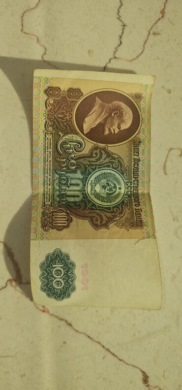çin pulu: SATILIR.
Keçmiş SSRİ 100 rubl 1991 ci il