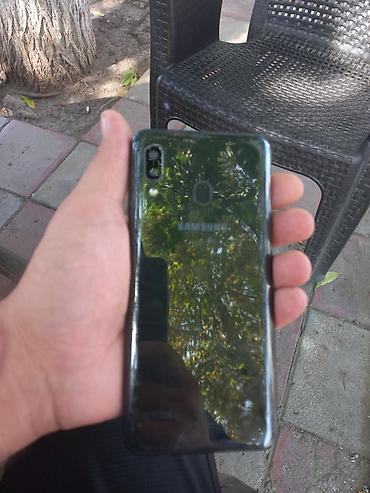 Samsung Galaxy A20, 4 GB, rəng - Qara, Barmaq izi