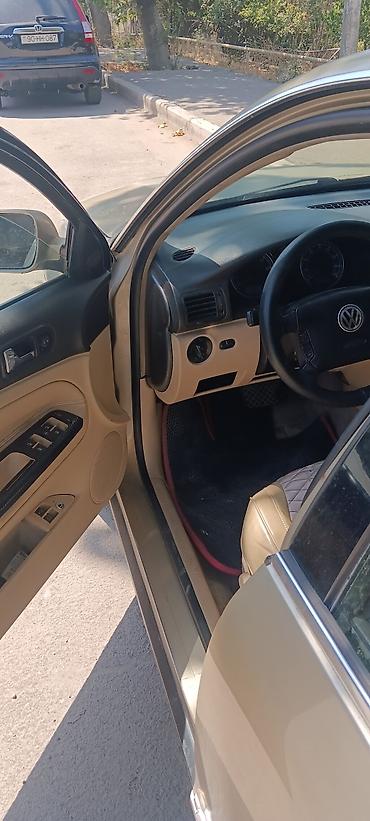 99 maşını: Volkswagen Amarok: 1.8 l | 2001 il Sedan — 5