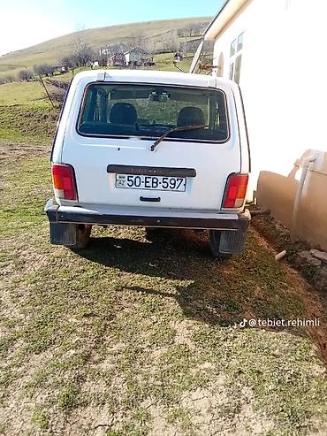 niva barter: LADA Niva 4x4, ağ rəngli off-road SUV Xüsusiyyətlər: - Tam ötürücü — 1