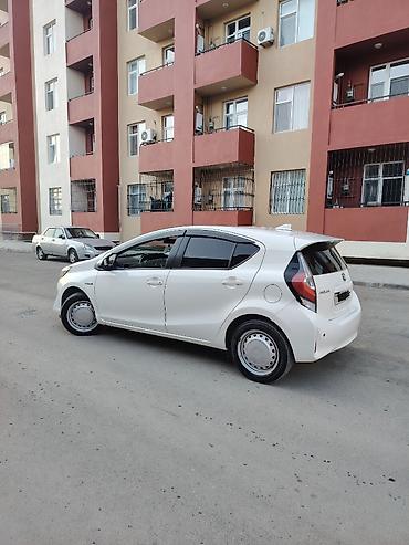 Транспорт: Toyota Aqua: 1.5 л | Хэтчбэк — 4
