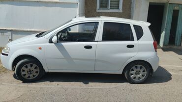 купить диски на паджеро 4: Автомобиль Daewoo Aveo в кузове хэтчбек белого цвета. Модель имеет
