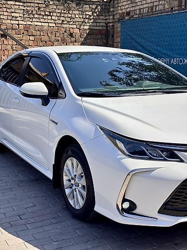eado ev: Toyota Corolla: 2021 г., 1.8 л, Вариатор, Гибрид, Седан — 1