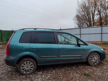 авто легковой: Автомобиль Mazda Premacy, практичный минивэн зеленого цвета с