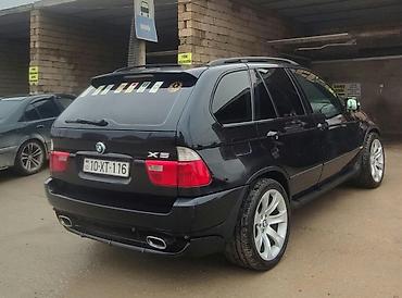 niva 4 qapili: BMW X5 (E53) – qara eksteryer, qırmızı dəri salon - Kuzov: SUV, qara — 8
