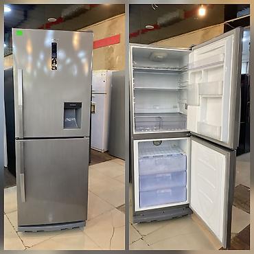 evroluks televizor: İki qapılı, alt hissədə dondurucu olan inox rəngli soyuducu — 1