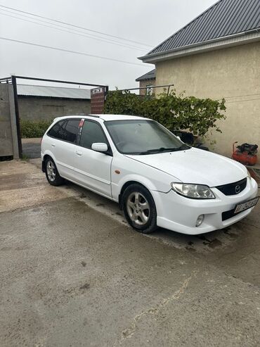 машины за 4000 долларов: Mazda Familia: 2002 г., 1.5 л, Автомат, Бензин