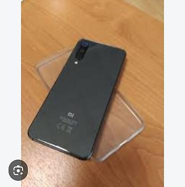 gen: Xiaomi Mi 9 SE, rəng - Qara, 
 Barmaq izi — 1