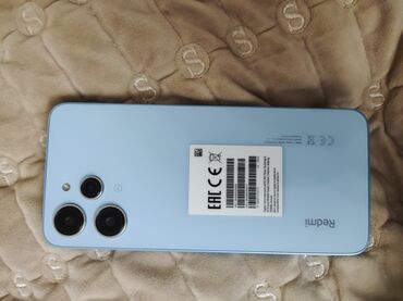 xiaomi telefonlari satilir: Xiaomi Redmi 12, 256 GB, rəng - Mavi, 
 Zəmanət, Sensor, Barmaq izi