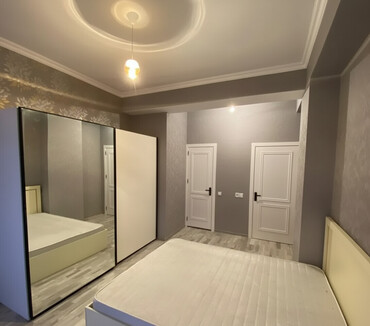 Uzunmüddətli kirayə mənzillər: 2 otaqlı, 12-ci mərtəbə, tam təmirli mənzil Tam əşyalı: kondisioner — 2