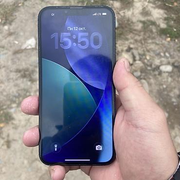 Apple iPhone 13 mini, тёмный цвет корпуса. Компактный смартфон с