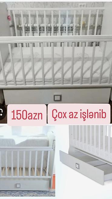 Beşiklər: Uşaq beşiyi – ağ rəng, klassik barmaqlı dizayn. Xüsusiyyətlər: - — 1