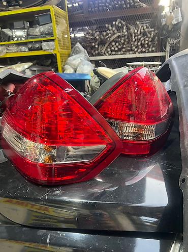 nama mini: Nissan tida sedan arxa stoplari orginal — 2
