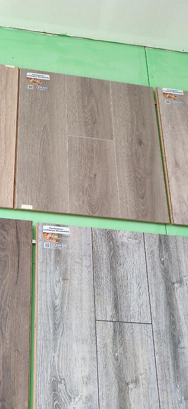 mdf laminat satışı: Məhsul: Laminat döşəmə panelləri Təsvir: - Taxta teksturalı laminat — 1