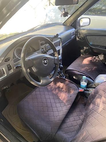 lisan 9: Daewoo Nexia: 2009 г., Механика, Седан — 5