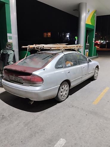 mazda 2000: Mazda Cronos: 1993 г., 1.8 л, Механика, Бензин, Хэтчбэк — 8