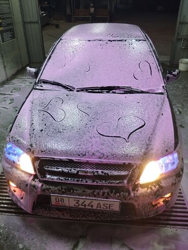 фары опель вектра б: Седан Mitsubishi Lancer, окрашенный в черный цвет, выделяется