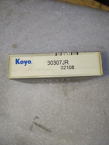 голограммы: Роликовый конический подшипник Koyo 30307JR. - Производитель: Koyo — 2