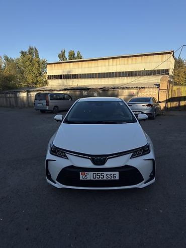 росрочка: Toyota Corolla: 2019 г., 1.8 л, Гибрид, Седан — 1