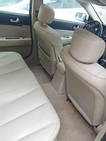 mitsubisi: Mitsubishi Galant sedan Xüsusiyyətlər: - Kuzov: ağ rəngli sedan, 4 — 6