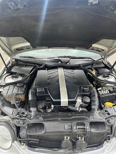 99 maşını: Mercedes-Benz 240: 2.4 l | 2000 il Sedan — 5