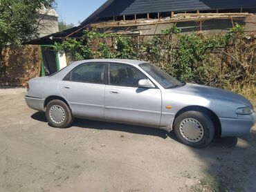 молочное оборудование: Mazda 626: 1992 г., 2 л, Механика, Бензин, Седан