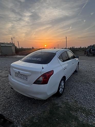 kollektor qutusu: Nissan Sunny: 1.5 l | 2013 il Sedan — 7