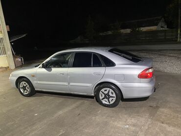 битий авто: Mazda 626: 2001 г., 2 л, Механика, Газ, Хетчбек