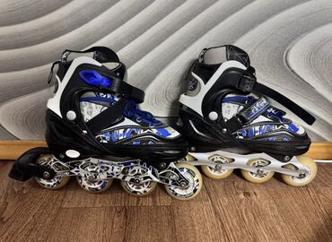 исык кол: Ролики раздвижные (детско-подростковые), сине‑черно‑белая расцветка