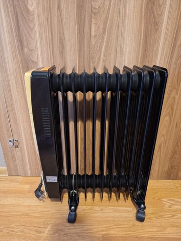 Elektrikli qızdırıcılar və radiatorlar: Yağ radiatoru
