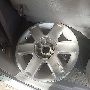 летние резина: Комплект из 4 литых дисков R15 - Диаметр: 15 - Посадочные отверстия — 2
