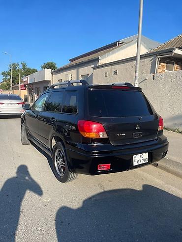 mitsubishi pikap: Mitsubishi Outlander, qara rəng, 5 qapılı krossover/SUV — 3
