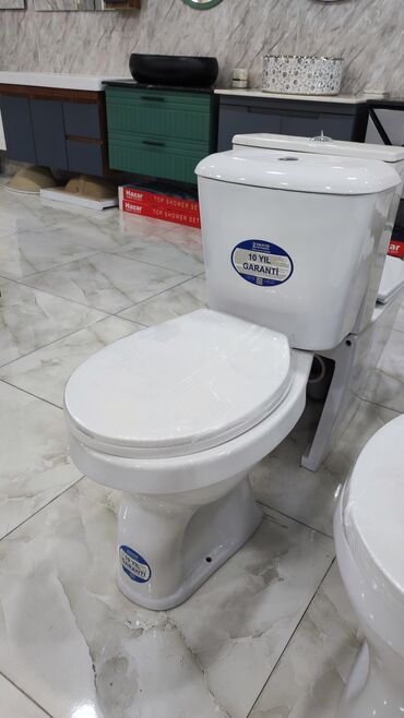 Təmir və tikinti: Ağ rəngli unitaz dəsti, hamam otaqları üçün nəzərdə tutulmuşdur. Dəstə