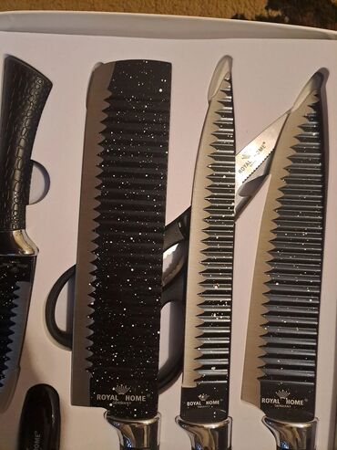 Bıçaqlar: Royal Home 7 parça mətbəx dəsti Tərkib: - 1 ədəd iri aşpaz bıçağı - 1 — 6