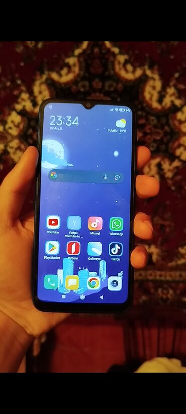 telfon satiwi: Xiaomi Redmi 9C, 64 GB, rəng - Mavi, 
 Barmaq izi, İki sim kartlı, Face ID