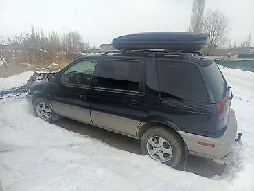 Другие автомобили: Минивэн с багажным боксом на крыше Основные характеристики по фото: - — 9