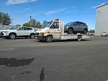 Услуги эвакуатора: С лебедкой — 8