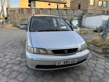 крайслер додж: Минивэн Honda Odyssey серебристого цвета. Вместительный салон с серыми