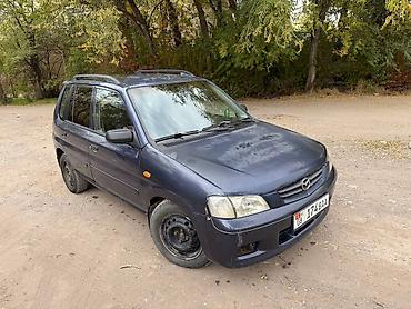 ann chery: Mazda Demio: 2001 г., 1.5 л, Механика, Бензин — 2
