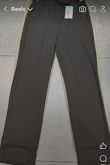 pantalone sat: Pantalone sa dzepovima i elasticnim pojasem na redice. Puder — 2